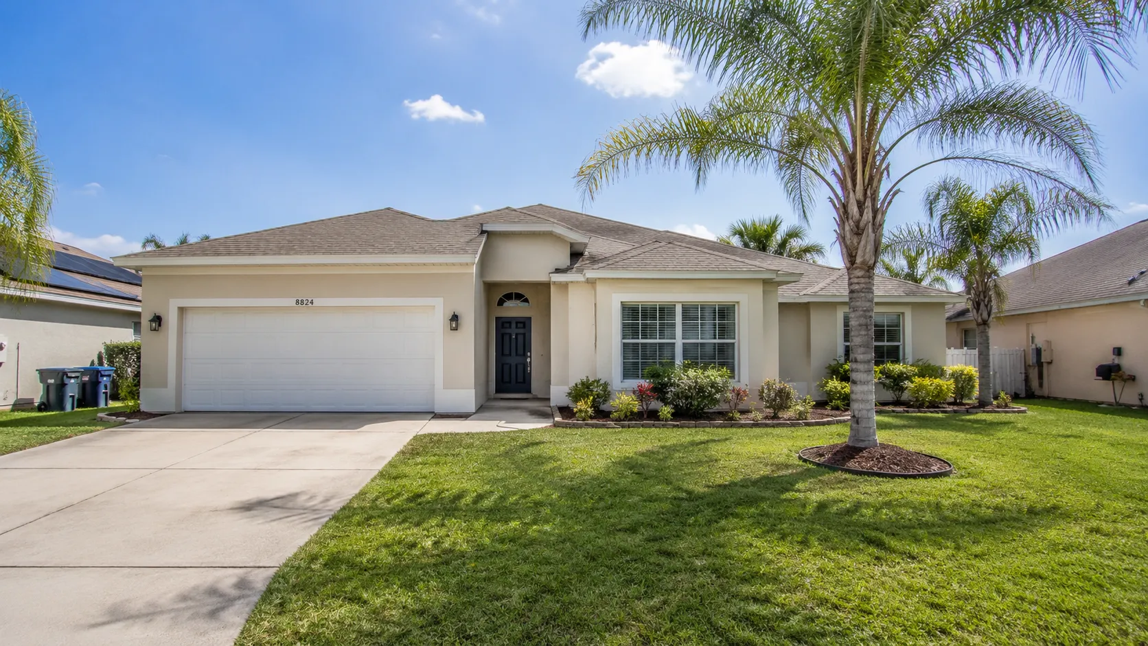 Modern family home in Horizon West community with landscaped yard