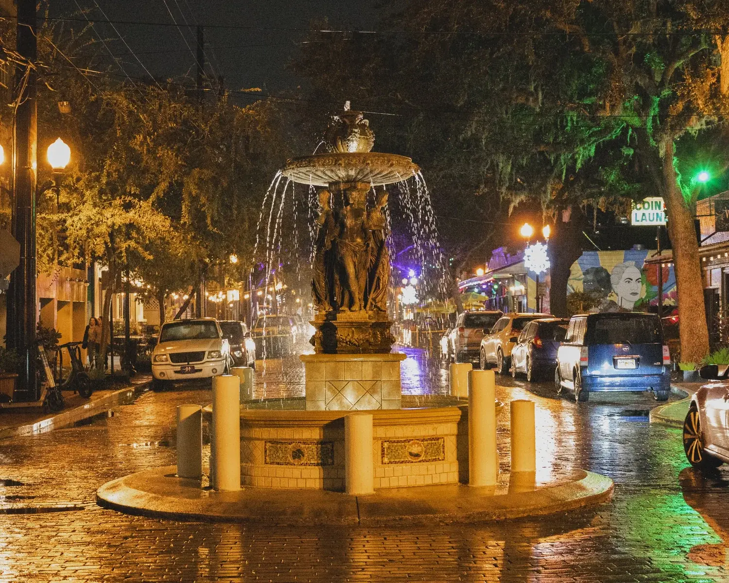 Lake Eola fountain illuminated at night near South Eola